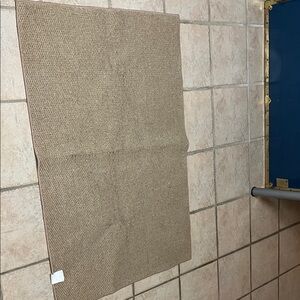 #28.B Elegant Tan Bath Mat